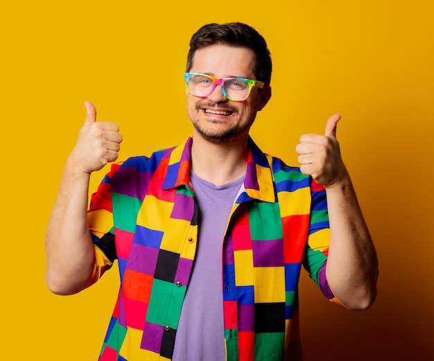 Style guy in 90s shirt and glasses