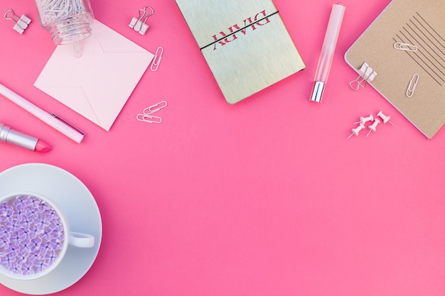 Styled pink feminine workspace flat lay