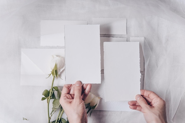 Styled stock photo Wedding invitation card mockup White bridal bouquet Flat lay mockup