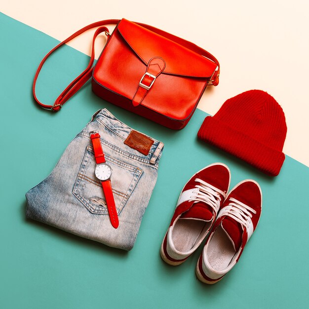 Stylish accessories and clothing. Focus on red. Handbags, caps, watches. Sneakers. Urban style, Denim