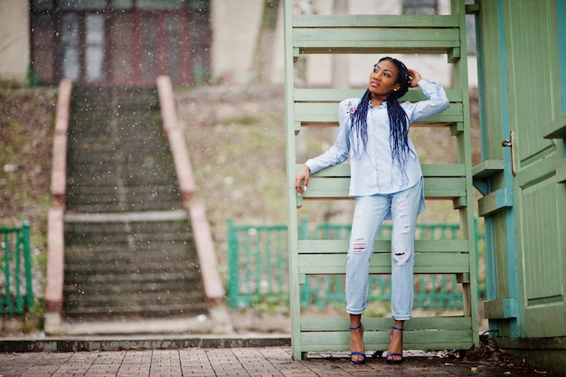 Stylish african american girl with dreads outdoor