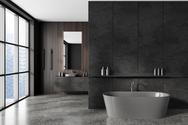 Stylish bathroom interior with sink and tub empty dark concrete wall