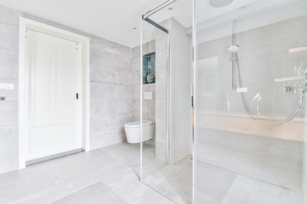 Stylish bathroom with large marble tiles