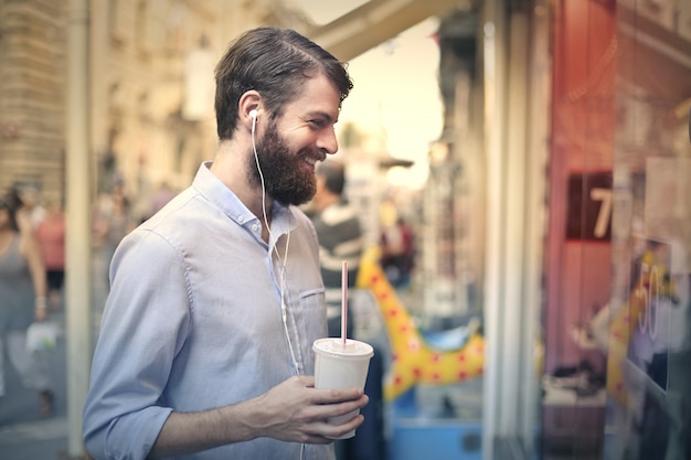 Stylish bearded man shopping