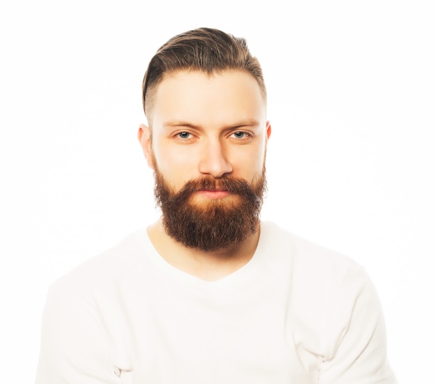 Stylish bearded man in white shirt.