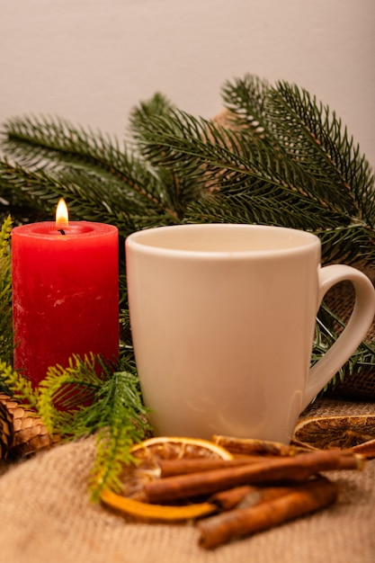 Stylish beautiful New Years composition of cones spruce and candles