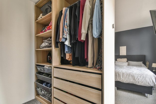 Stylish bedroom with bed and wardrobe