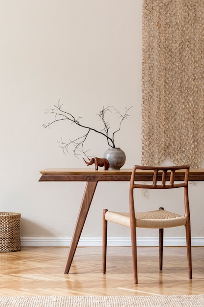 Photo stylish beige interior of modern dining room with design wooden oak table and chairs, vase with flowers, elegant rattan accessories and decoration. korean style of home decor.