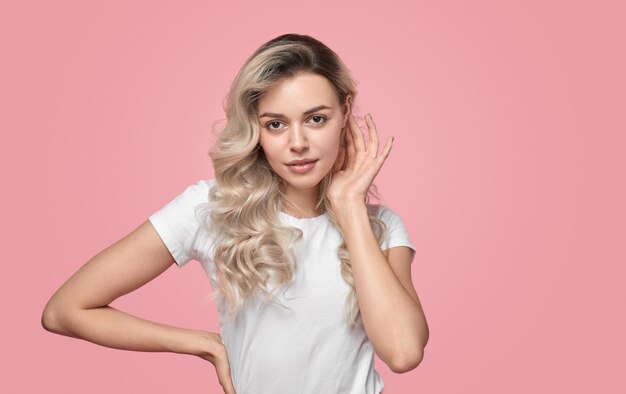 Stylish blond woman in studio