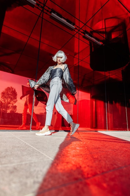 Stylish blonde on a red background