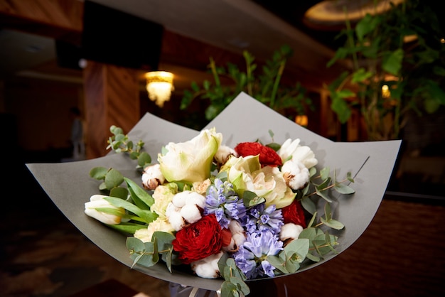 A stylish bouquet of flowers in the restaurant hall.