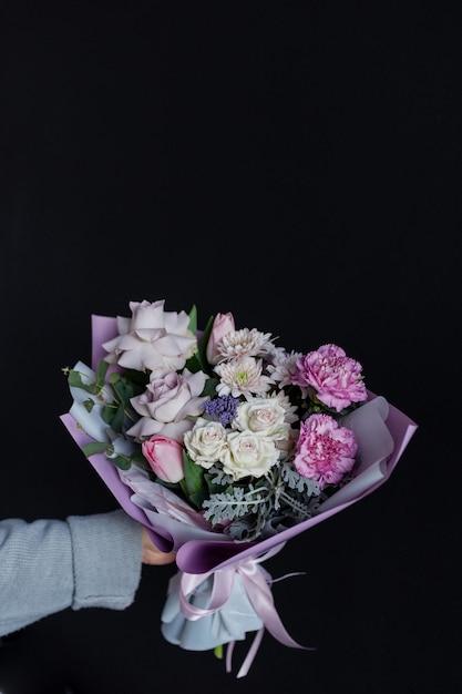 Stylish bouquets on a black background rose maritim