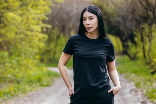 Stylish brunette asian girl wearing black tshirt