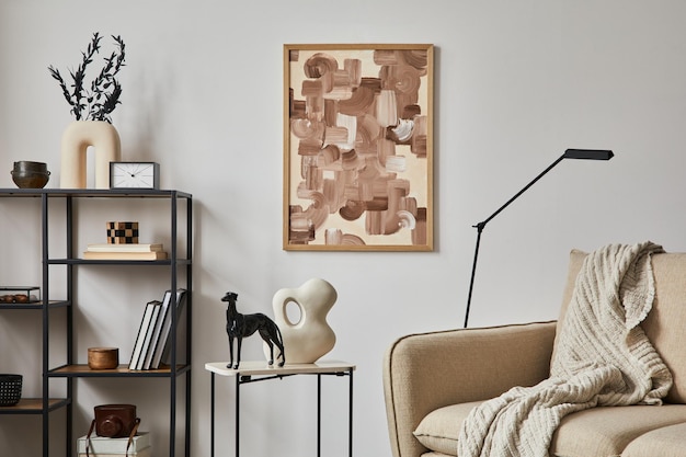 Stylish composition of elegant living room interior design with mock up poster frame, metal and wooden shelf, sofa, vintage vases and personal accessories. White wall. Copy space. Template.