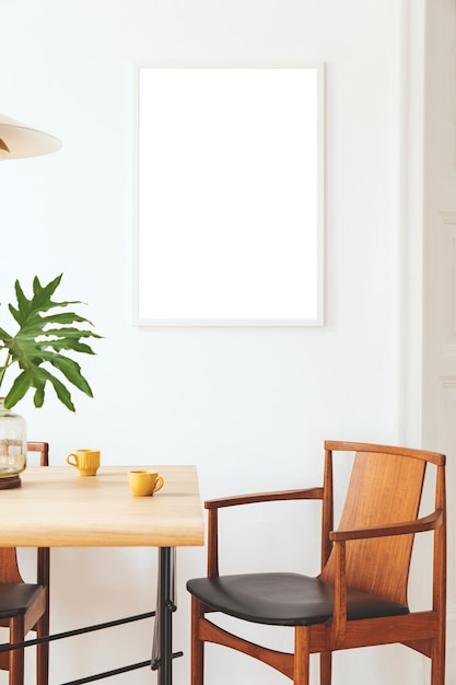 Photo stylish and eclectic dining room interior with  poster