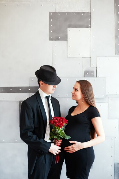 Stylish elegant young couple waiting a baby