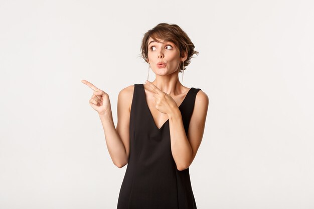 Stylish elegant young woman in black dress