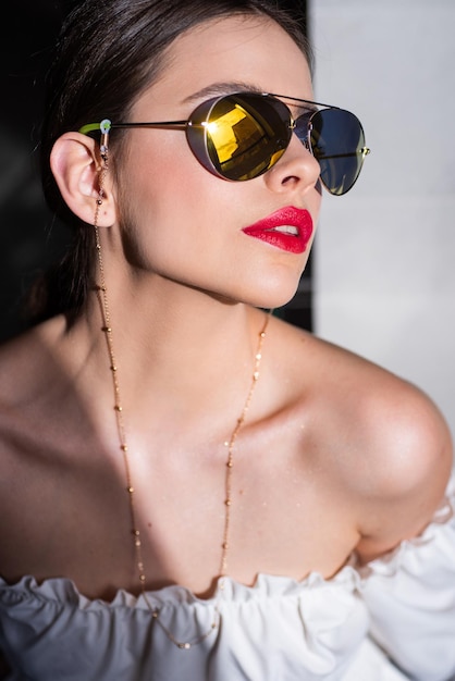 Stylish fashion woman in sunglasses, trendy fashionable accessories.