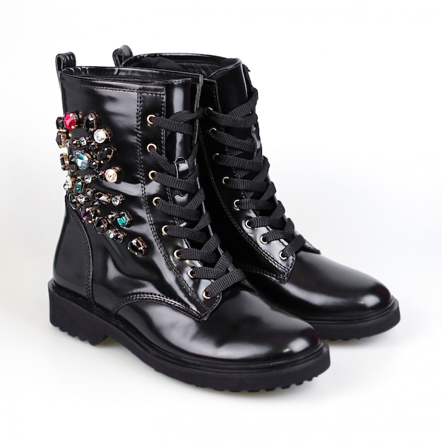 Stylish female boots with stones