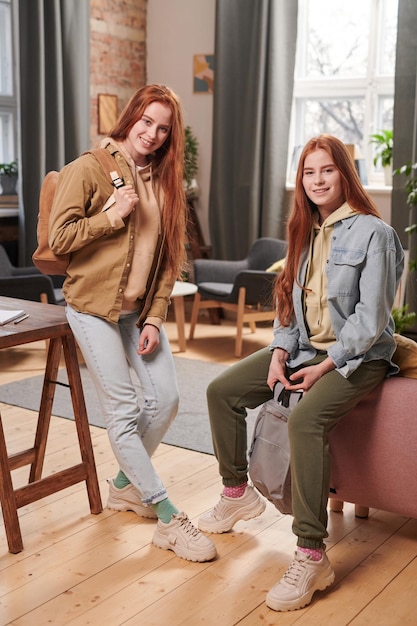 Stylish Female Students In Living Room