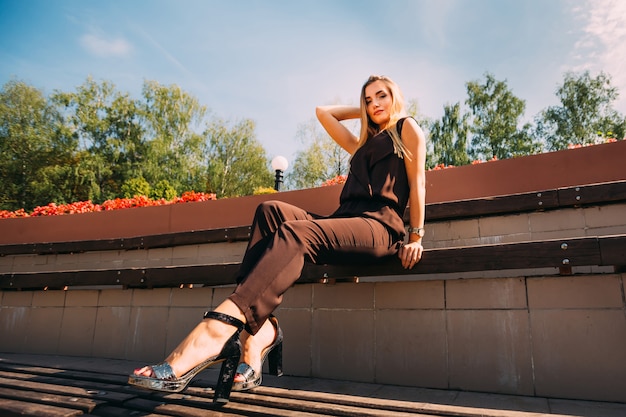 Stylish girl posing on street