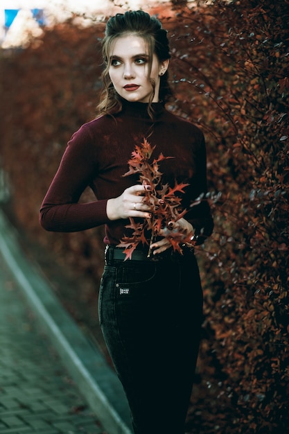 Stylish girl wearing jeans and turtleneck