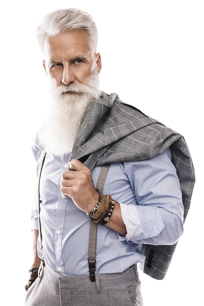 Stylish and handsome aged male model posing  on white