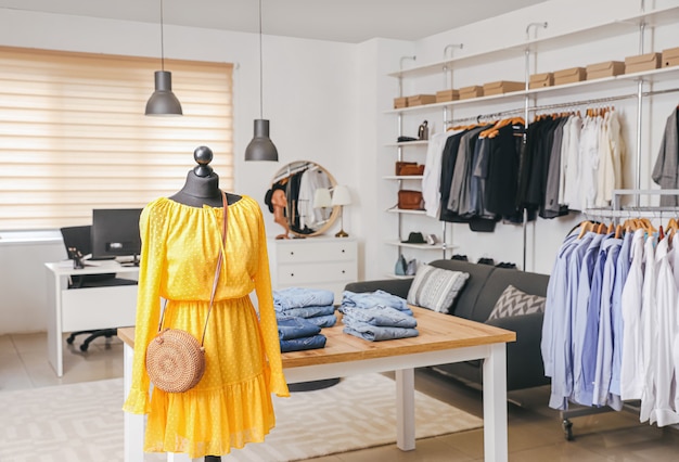 stylish interior of modern clothes store
