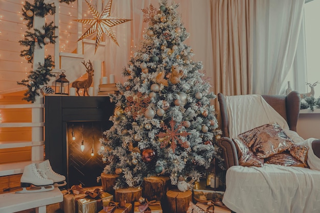 Stylish living room interior with beautiful fireplace Christmas tree Lights Presents Gifts Toys Candles And Garland Interior design