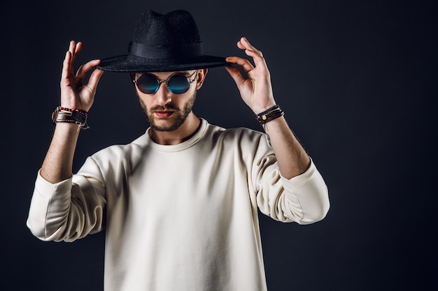 Stylish man in hat and sunglasses