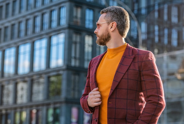 Stylish man in jacket look aside outdoor stylish man in the street stylish man outside