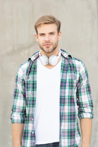 Stylish man music lifestyle concept man music lifestyle wearing checkered shirt