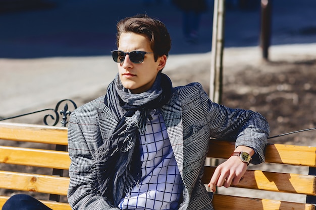 Stylish man in sunglasses on street