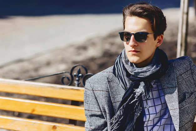 Stylish man in sunglasses on street