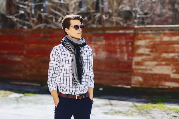 Stylish man in sunglasses on street