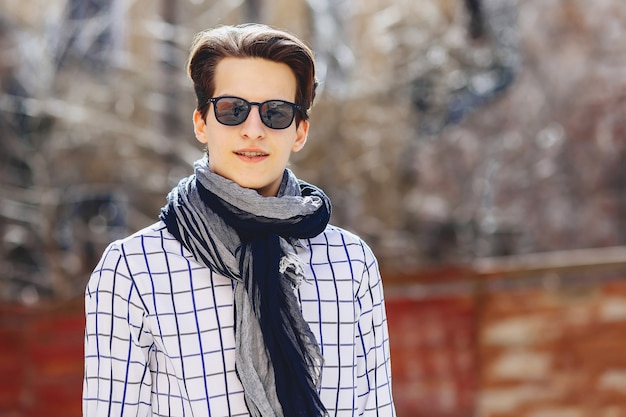 Stylish man in sunglasses on street