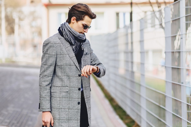 Stylish man in sunglasses on street