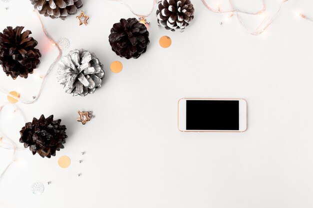 stylish mobile display mockup Christmas, christmas decorations on white screen