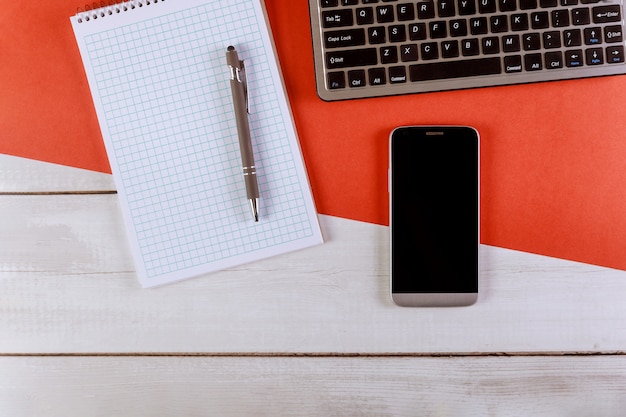 Stylish office table with supplies and devices