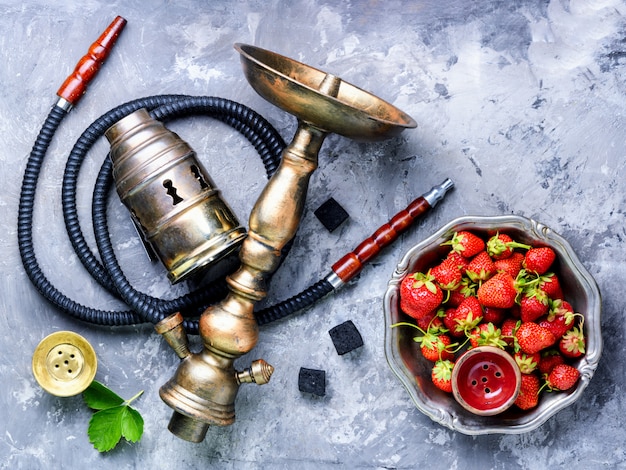 Stylish oriental shisha with strawberry