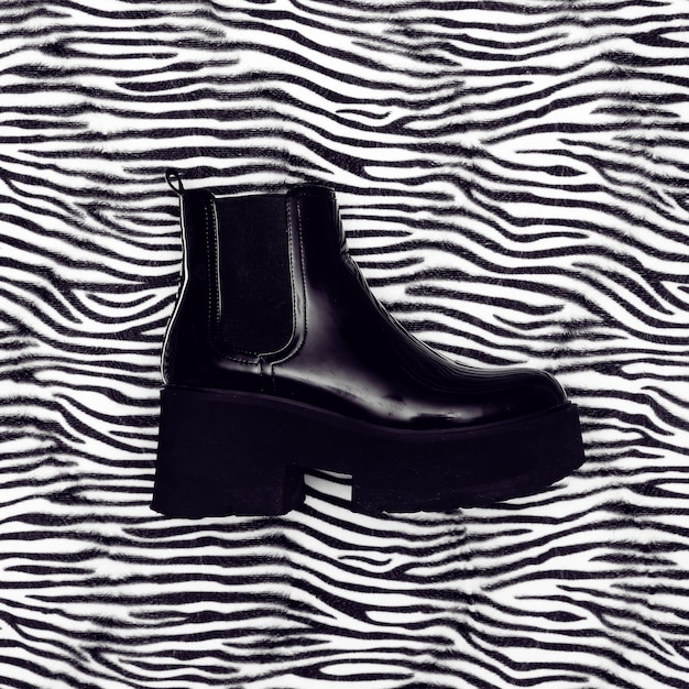 Stylish platform boots. Fashion minimal flat lay art