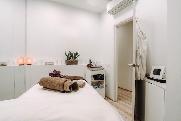 Stylish Spa room interior with massage table