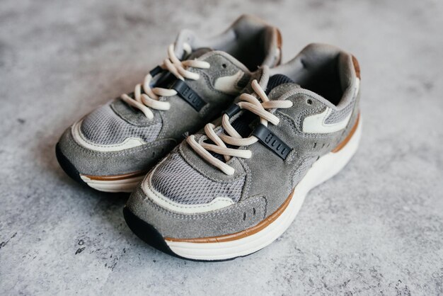 Stylish sports sneakers isolated on a gray backgroundxA