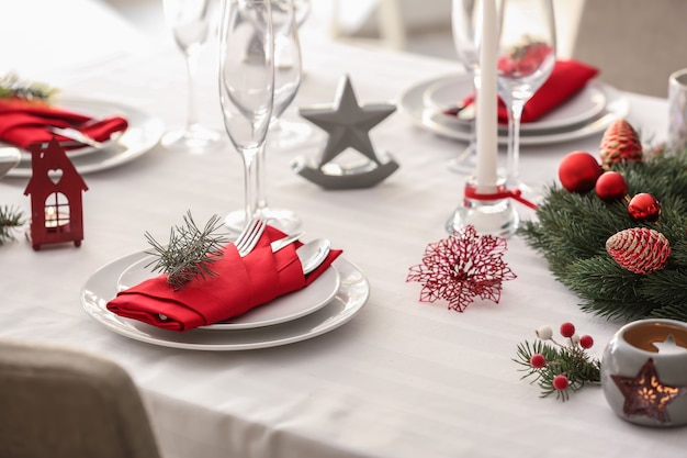 Stylish table setting with Christmas decorations