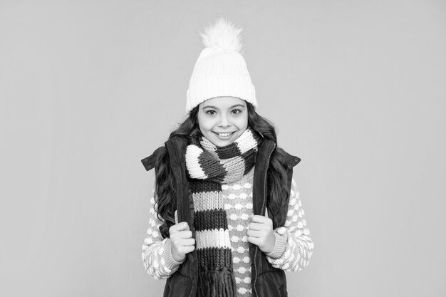 Stylish teen girl on blue background portrait of child wearing warm clothes