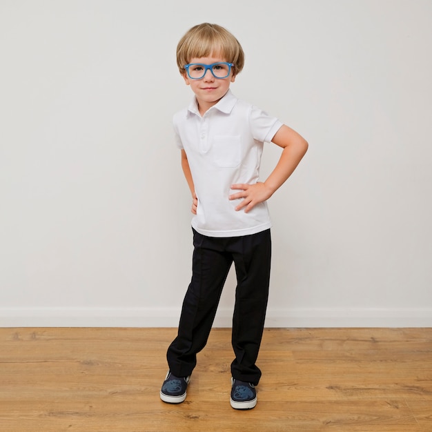 Stylish trendy little boy in glasses. 