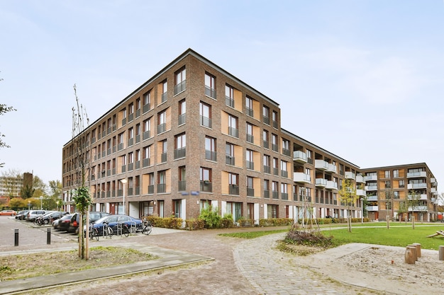 Stylish view of residential building with parking