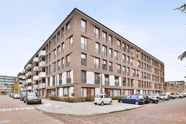 Stylish view of residential building with parking