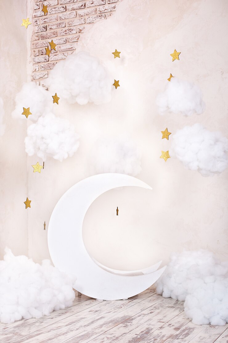 Stylish vintage children's room with a wooden moon and textile clouds. Children location for a photo shoot. Moon with stars and clouds dreamy decor. Stylish vintage children's room with a wooden moon