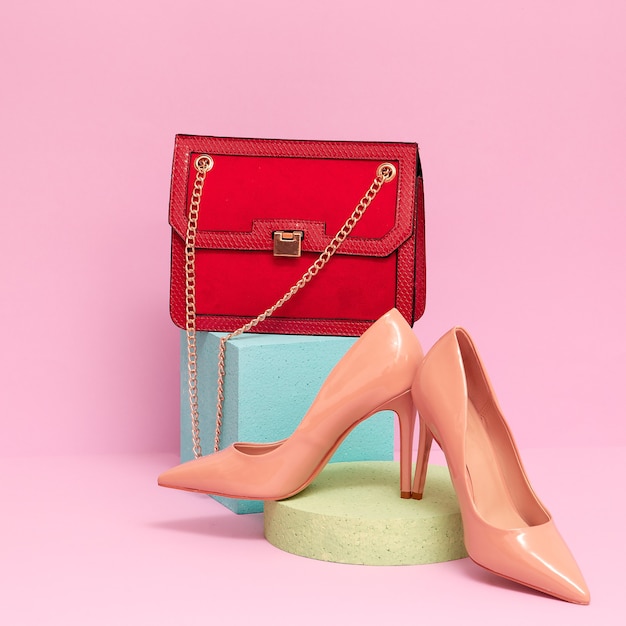 Stylish vintage clutch bag and patent leather shoes. Fashion concept
